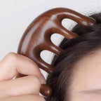 Wooden head massager.