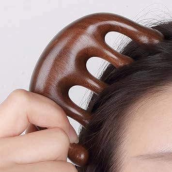 Wooden head massager.